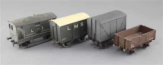 An SR open wagon, 10T, no.6905, in brown, an LMS box van, no.32573, in grey, a box van in grey and an LMS